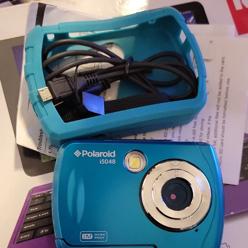 Polaroid iS048 Blue Digital Point-and-Shoot Camera with Blue Silicone Case